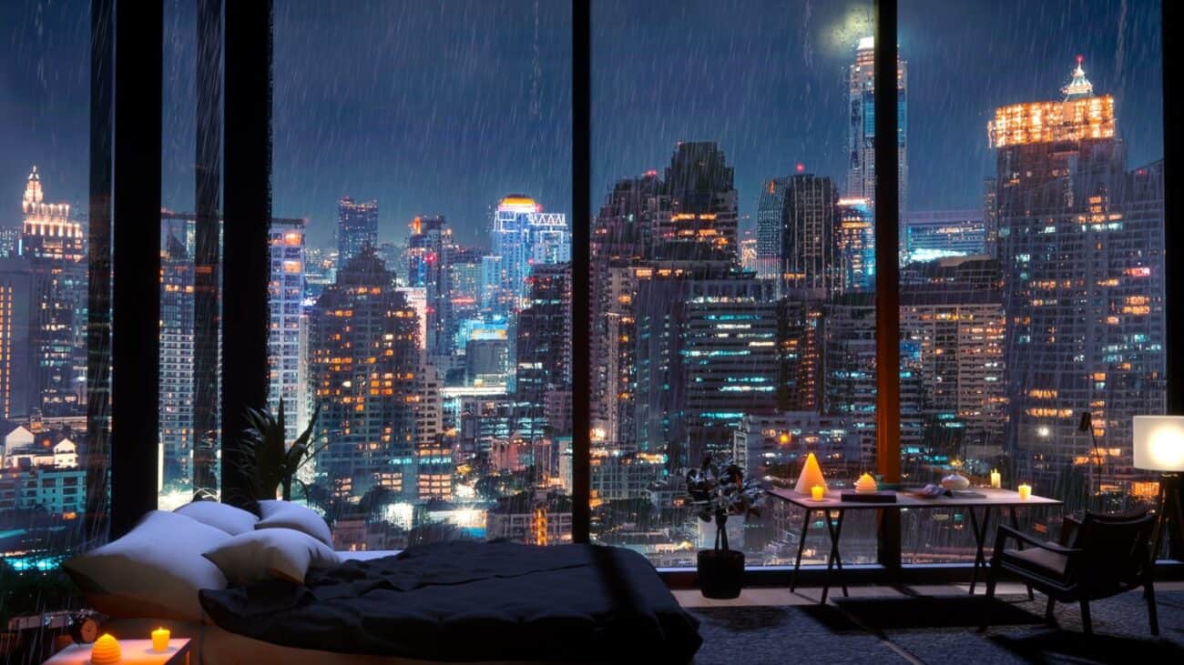 Bangkok hotel bedroom with a night city skyline view