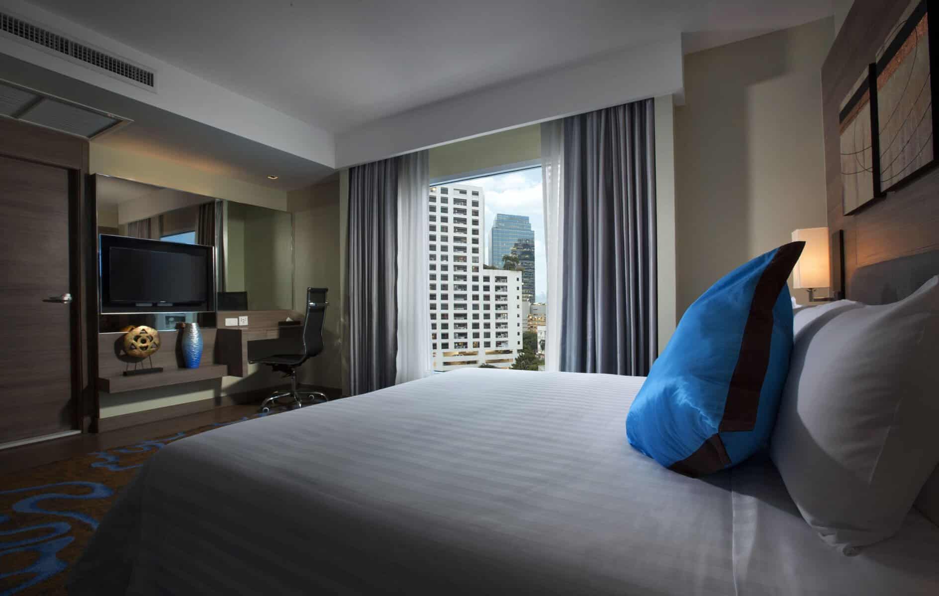 A Citrus Sukhumvit 11 room looking out over Soi 11 towards the Sukhumvit skyline