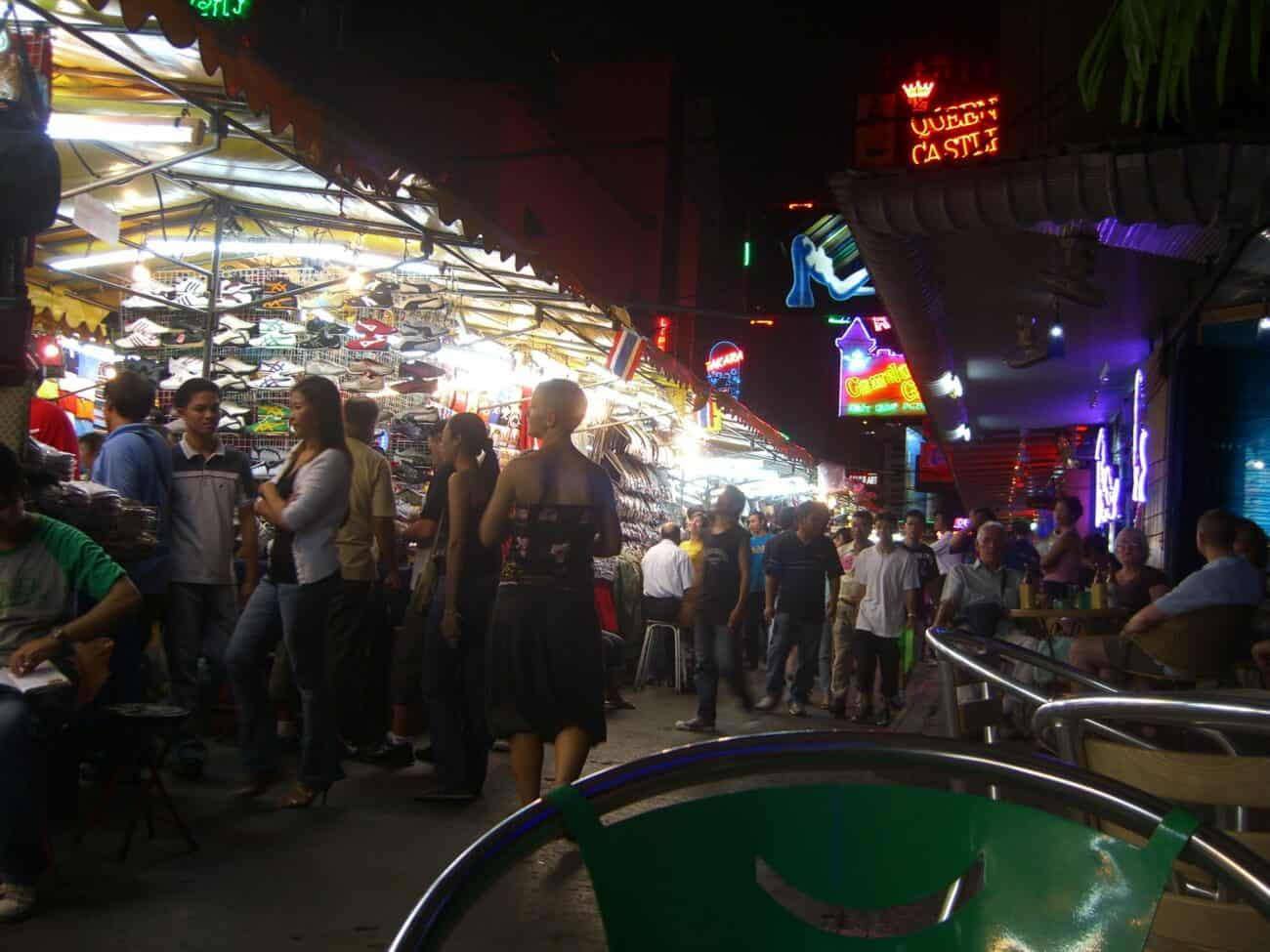 Patpong at night between Silom and Surawong, night-market stalls and bar neon