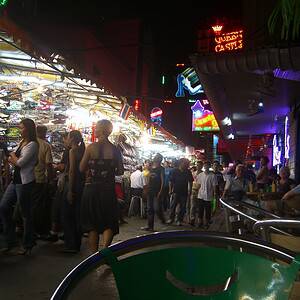 Patpong at night between Silom and Surawong, night-market stalls and bar neon