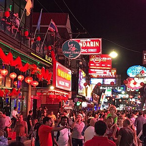Walking Street Pattaya at night — neon go-go bars and crowds