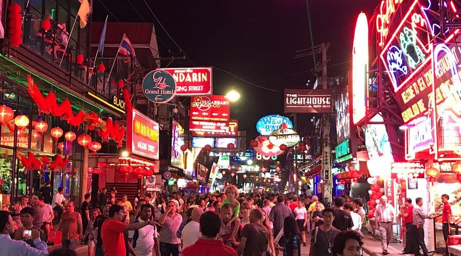 Walking Street Pattaya at night — neon go-go bars and crowds