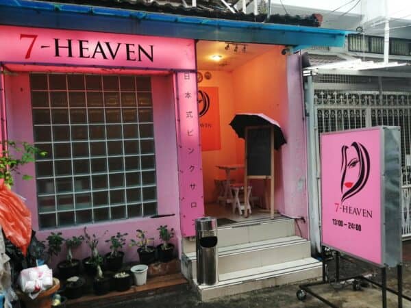 Pink 7-Heaven shopfront and lightbox sign on Sukhumvit Soi 33, Bangkok