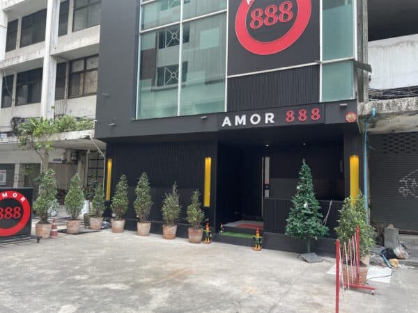The Amor 888 building on Sukhumvit Soi 18, Bangkok, with its 888 logo
