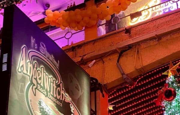The Angelwitch sign hanging in Nana Plaza, Bangkok