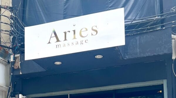 Aries Massage sign above the shopfront on Sukhumvit Soi 31, Bangkok