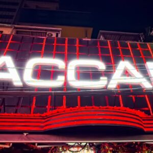 The illuminated Baccara sign on Soi Cowboy, Bangkok