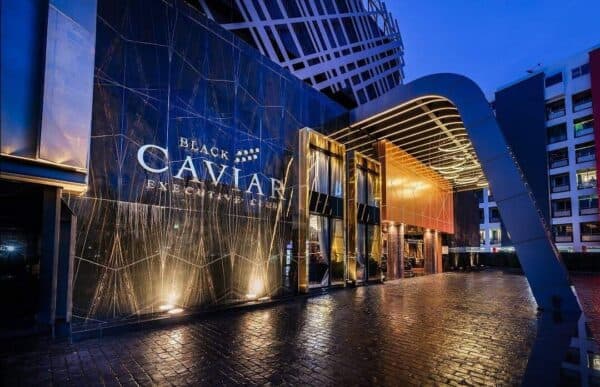 Lit Black Caviar Executive Club facade off Ratchadaphisek Road, Bangkok