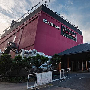 The Colonze Massage & Entertainment building on Rama 9 Road, Bangkok, with its signage and porch