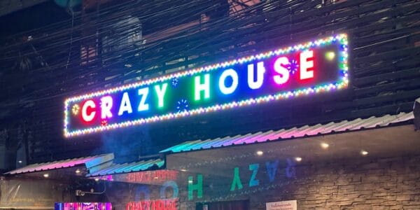Illuminated Crazy House sign at the Soi 23 end of Soi Cowboy, Bangkok