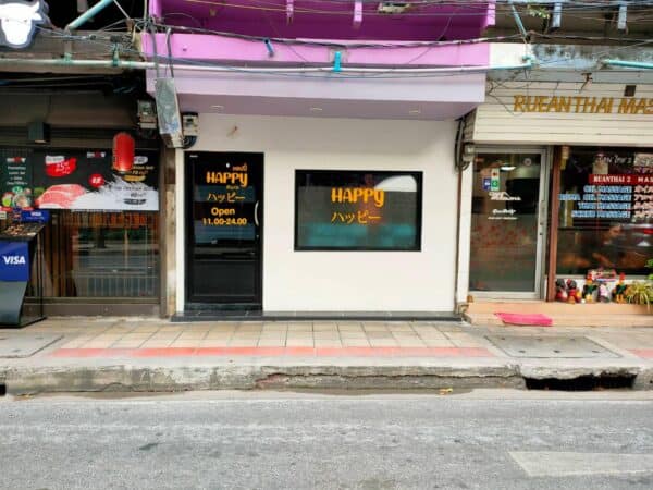 Happy BKK Massage shopfront on Sukhumvit Road near Soi 24, Bangkok