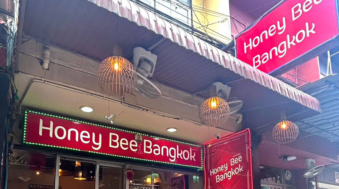 Honey Bee Bangkok signs over the shopfront on Sukhumvit Soi 22