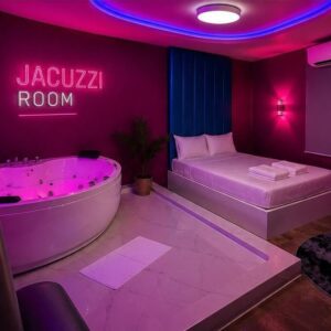 Jacuzzi room with neon lettering at Pattaya Vice Nuru Massage, Pattaya